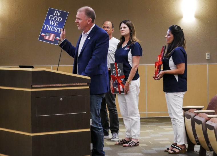 Image: PatriotMobile donated "In God We Trust" signs to Southlake Carroll ISD in 2022.