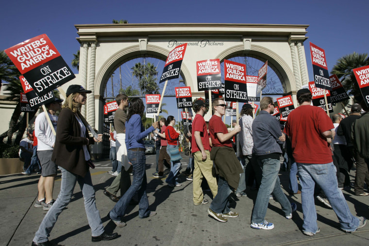 Striking writers walk the picket line outside Paramount Studios in Los Angeles