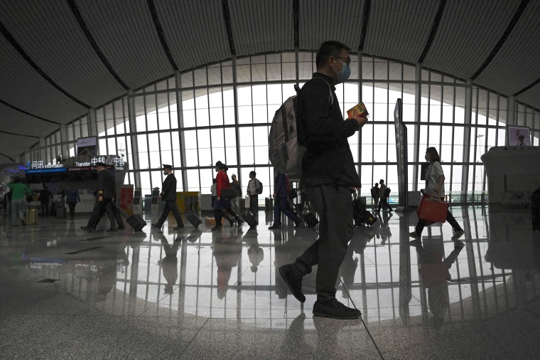 Travelers at the Beijing Daxing International Airport in Beijing