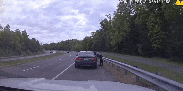 An out-of-control car crosses the median and crashes into a car stopped by a police officer in Fairfax County, Virginia.