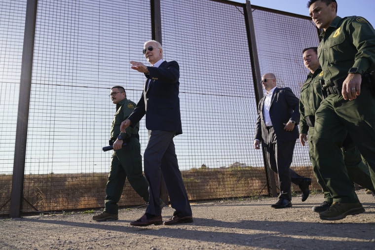 President Joe Biden walks along a stretch of the U.S.-Mexico border in El Paso Texas, Jan. 8, 2023.