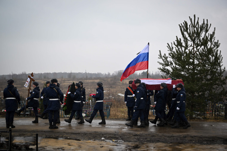 A funeral ceremony for a fallen Russian soldier at a cemetery in Tula Oblast, Russia