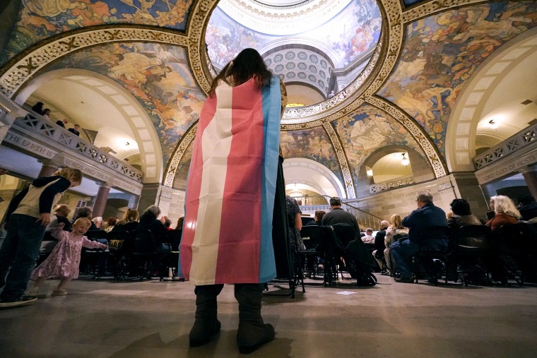 A supporter of transgender rights protests during a rally in favor of a ban on gender-affirming health care legislation on March 20, 2023, at the Missouri Statehouse in Jefferson City.