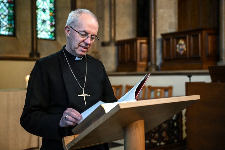 Image: Archbishop of Canterbury Justin Welby studies the Coronation Bible at Lambeth Palace in London on April 20, 2023.