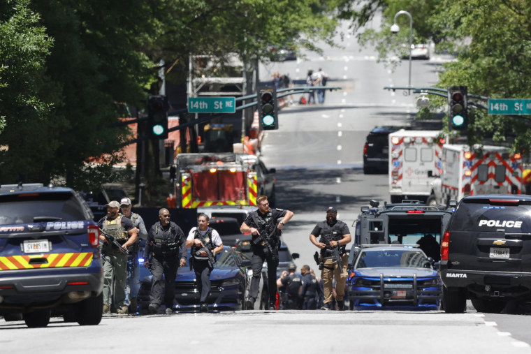 Law enforcement officers near the scene of an active shooter in Atlanta on May 3, 2023.