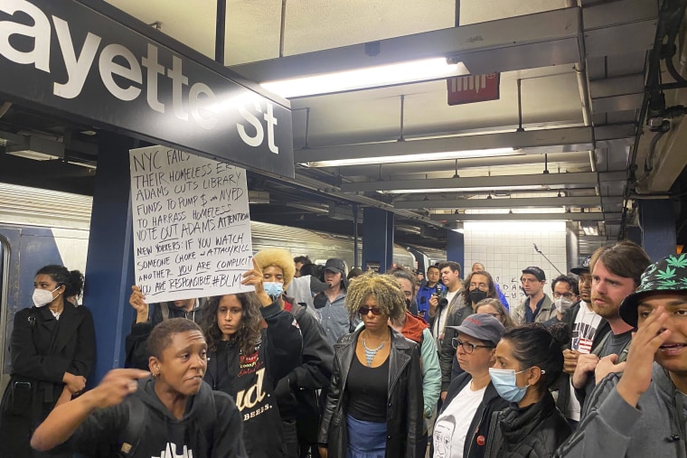 Protesters march through the Broadway-Lafayette subway station  to protest the death of Jordan Neely, Wednesday afternoon, May 3, 2023 in New York. Four people were arrested, police said. Neely, a man who was suffering an apparent mental health episode aboard a New York City subway, died this week after being placed in a headlock by a fellow rider on Monday, May 1, according to police officials and video of the encounter.