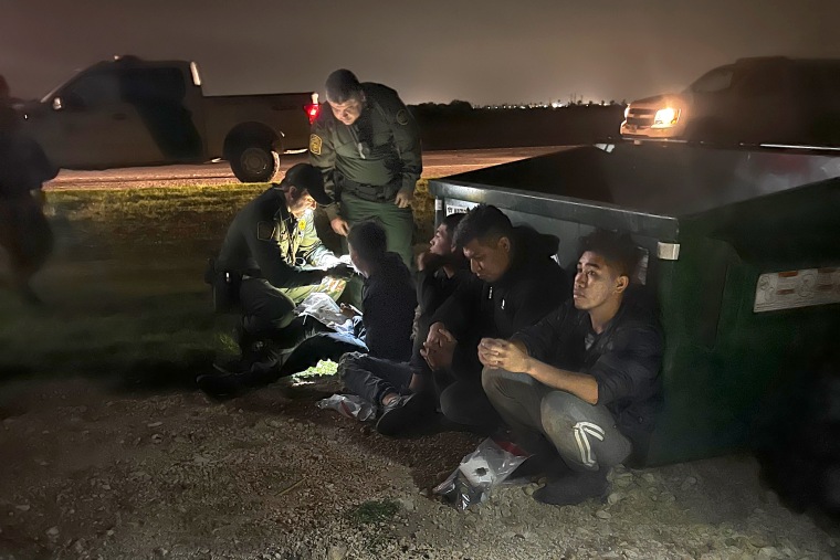 Border Patrol apprehends migrant men early Thursday in Granjeno, Texas.

