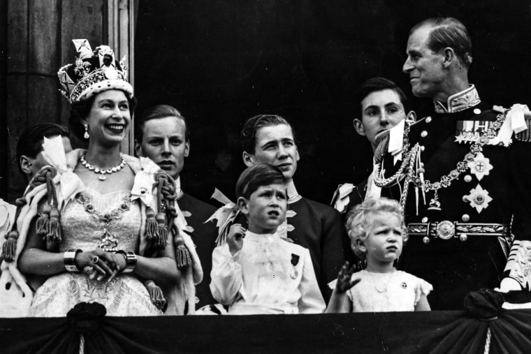 Queen Elizabeth II on the balcony of Buckingham Palace after her Coronation ceremony with Prince Charles, Princess Anne and The Prince Philip, Duke of Edinburgh on June 2, 1953.