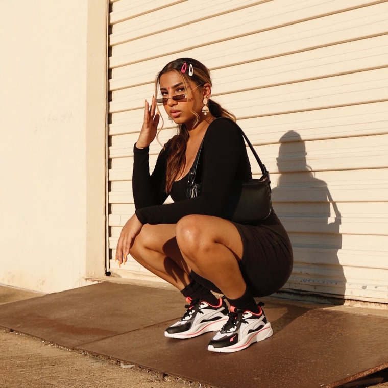 Influencer Milan Mathew has found ways to incorporate formal South Asian jewelry into her streetwear style. 