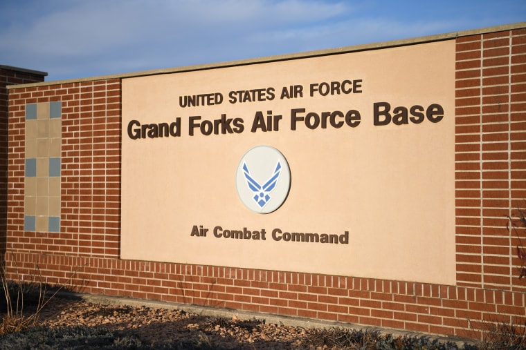 An installation sign is displayed at the main gate of Grand Forks Air Force Base, North Dakota Oct. 31, 2019. Grand Forks AFB is home to the 319th Reconnaissance Wing which provides high-altitude intelligence, surveillance, and reconnaissance to the United States Air Force. (U.S. Air Force photo by Airman 1st Class Brody Katka)