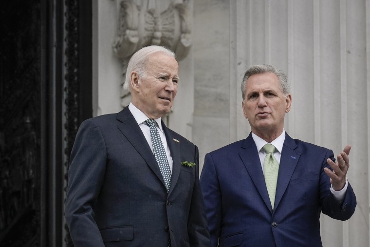 President Joe Biden and Speaker of the House Kevin McCarthy leave the Capitol