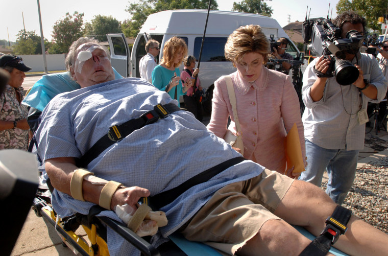  St. James Davis returns to his home, escorted by attorney Gloria Allred, following the chimp attack earlier in 2005.