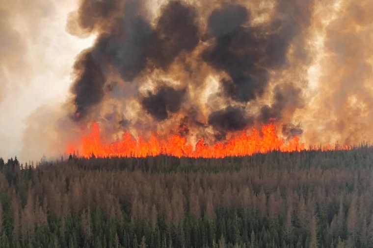 A wildfire burns near Evansburg, Canada