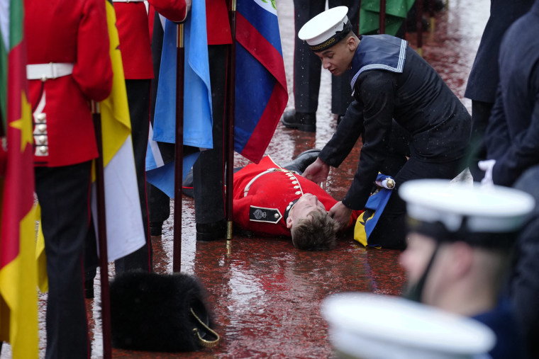 Assistance is provided to a flag bearer who collapsed