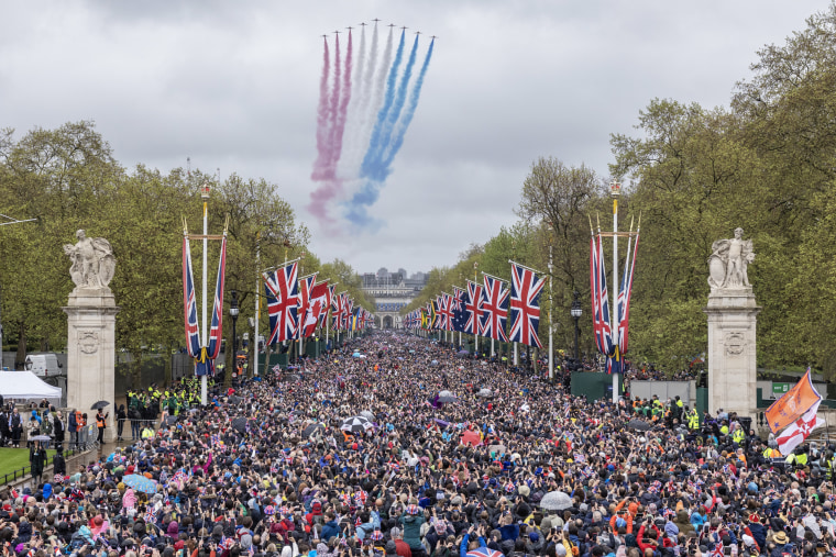 The Royal Air Force Aerobatic Team  fly over Buckingham Palace during the Coronation of King Charles III and Queen Camilla