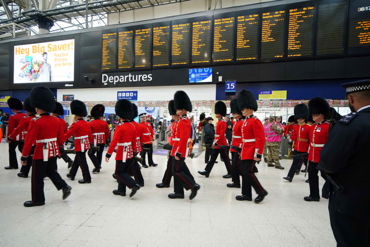 Members of the armed forces taking part in the coronation processions arrive into Waterloo station in London ahead of the coronation of King Charles III and Queen Camilla. Picture date: Saturday May 6, 2023. 