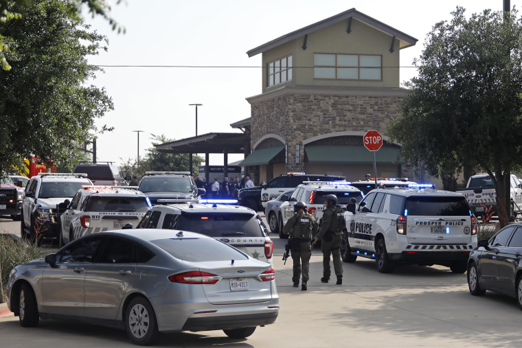 Emergency personnel work the scene of a shooting at Allen Premium Outlets on May 6, 2023 in Allen, Texas. 