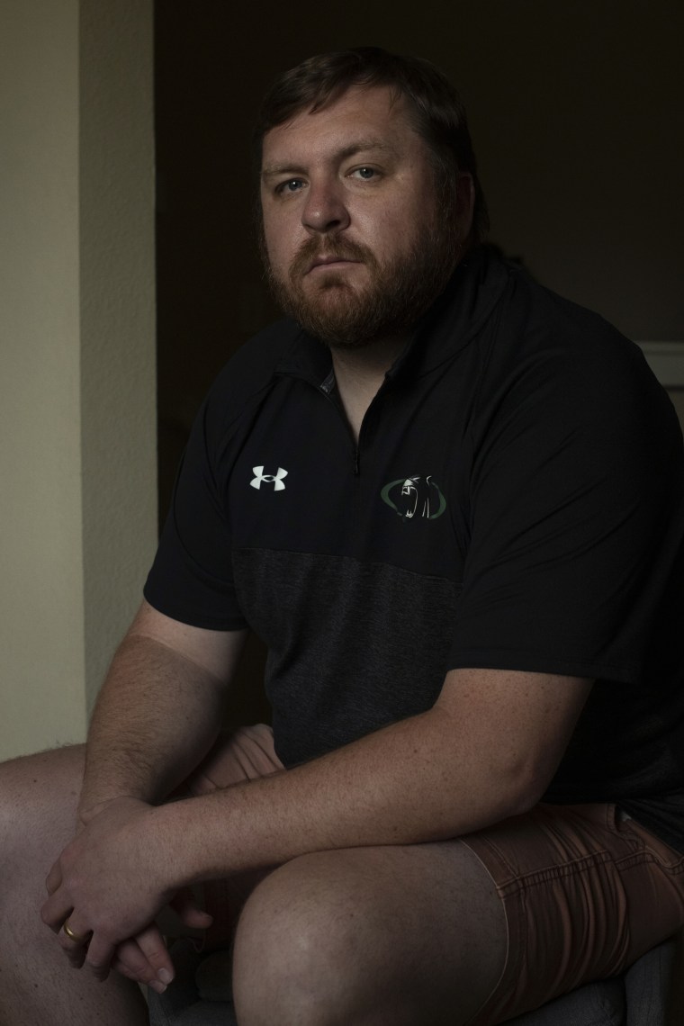 David Graf, former teacher and coach at Woodland Park High School, poses at his home on May 5, 2023 in Colorado Springs, Colorado.
