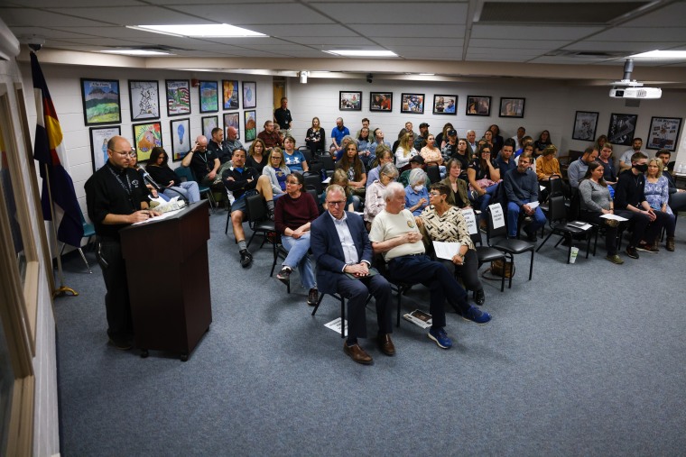 Community members attend the Woodland Park School District Board of Education meeting on April 12, 2023 in Woodland Park, Colo.