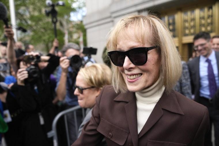 E. Jean Carroll walks out of Manhattan federal court, Tuesday, May 9, 2023, in New York. A jury has found Donald Trump liable for sexually abusing the advice columnist in 1996, awarding her $5 million in a judgment that could haunt the former president as he campaigns to regain the White House. (AP Photo/Seth Wenig)