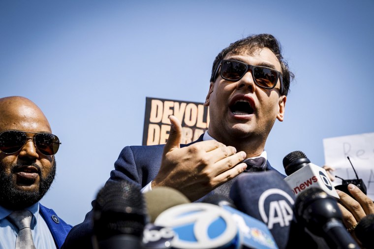 Image: Rep. George Santos, R-N.Y., speaks to the media outside the federal courthouse in Central Islip, N.Y., on May 10, 2023.