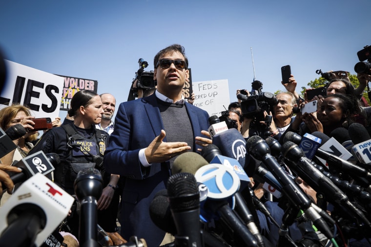 Image: Rep. George Santos, R-N.Y., speaks to the media outside the federal courthouse in Central Islip, N.Y., on May 10, 2023.