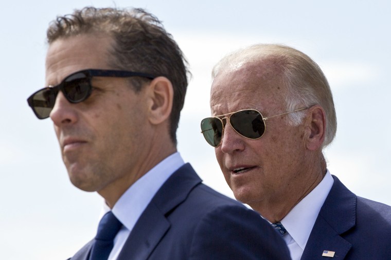 Hunter Biden and then-Vice President Joe Biden, centre, during a ceremony to name a national road after his late son Joseph R. "Beau" Biden III in the village of Sojevo, Kosovo, on Aug. 17, 2016.