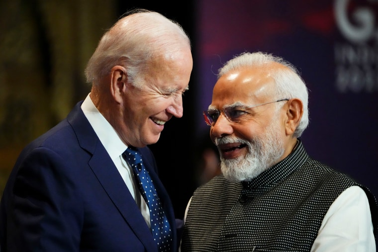 India's Prime Minister Narendra Modi with President Joe Biden at the G20 leaders summit in Nusa Dua, Bali, Indonesia
