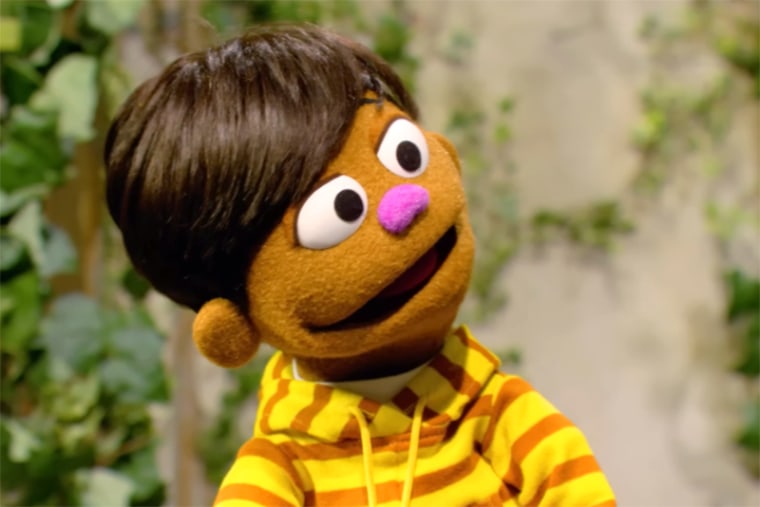 TJ character on Sesame Street.