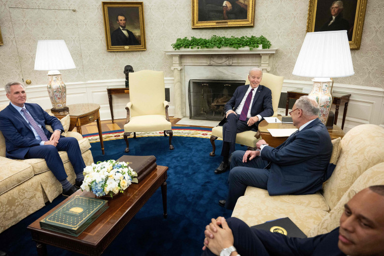 (L to R) Speaker of the House Kevin McCarthy (R-CA), US President Joe Biden, Senate Majority Leader Charles E. Schumer (D-NY), and House Minority Leader Hakeem Jeffries (D-NY) wait before a meeting about the United States's debt ceiling in the Oval Office of the White House May 9, 2023, in Washington, DC. Biden and Republican leaders met in hopes of breaking an impasse over the US debt limit. The lifting of the national debt ceiling  allows the government to pay for spending already incurred.