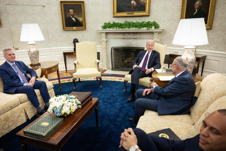 (Left to right) House Speaker Kevin McCarthy (R-CA), US President Joe Biden, Senate Majority Leader Charles E. Schumer (D-NY) and Senate Majority Leader House Minority Hakeem Jeffries (D-NY) wait before a meeting on the United States debt ceiling in the Oval Office of the White House May 9, 2023 in Washington, DC.  Biden and Republican leaders met in hopes of breaking a deadlock over the US debt limit.  Lifting the national debt ceiling allows the government to pay for expenses already incurred.