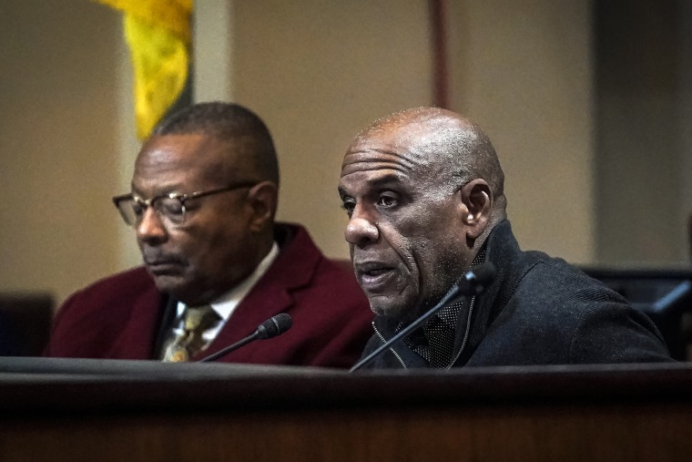 Image: Task Force members Steven Bradford, right, speaks next to Reginald Jones-Sawyer during a meeting by the Task Force to Study and Develop Reparation Proposals for African Americans, on Dec. 14, 2022, in Oakland, Calif.