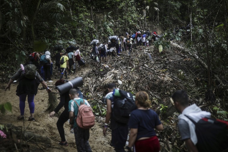 Image :Migrants walk across the Darien Gap from Colombia to Panama in hopes of reaching the U.S., on May 9, 2023.