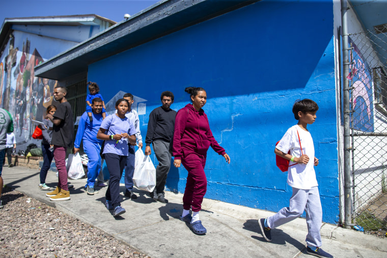 Image: A migrant family from Venezuela arrives to the shelter run by the Sacred Heart Church in El Paso, Texas, on May 12, 2023.