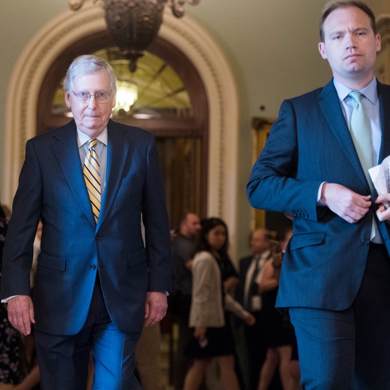 Sen. Mitch McConnell, R-Ky., with Doug Andres at the Capitol on July 9, 2019.