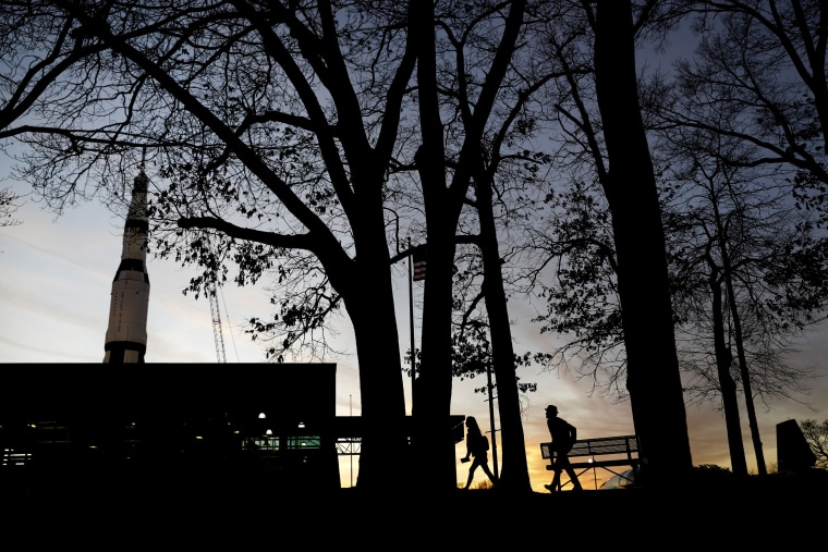 Visitors walk outside the state-operated U.S. Space & Rocket Center which serves as the visitor center for the nearby federally funded NASA Marshall Space Flight Center, in Huntsville, Ala., on Jan. 8, 2019.