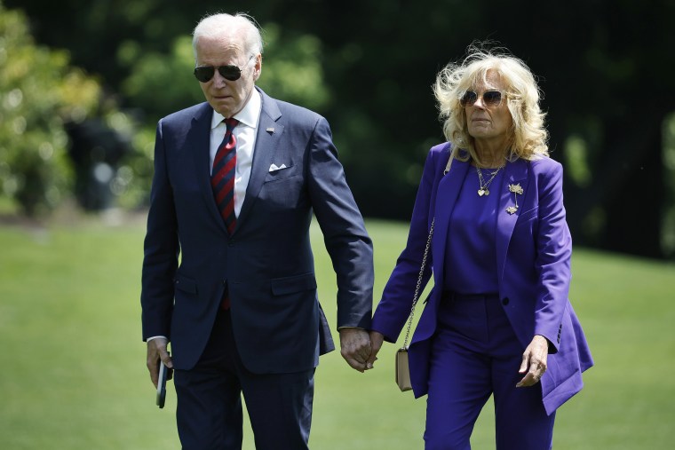 President Joe Biden and first lady Jill Biden walk across the South Lawn as they return to the White House on May 15, 2023 in Washington, DC. The Bidens attended their granddaughter Maisy Bidenâ€™s graduation ceremony at the University of Pennsylvania on Monday.