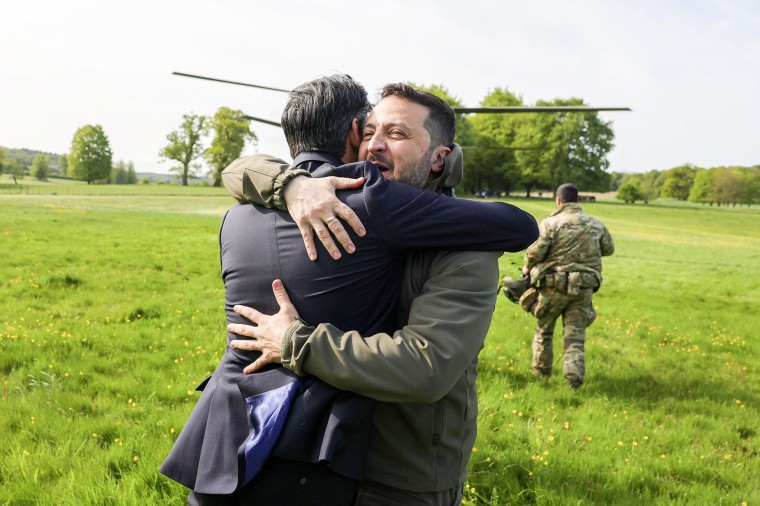 Zelenskyy hugs Sunak as he landed near London on Monday. Britain has emerged as one of Kyiv's strongest backers.
