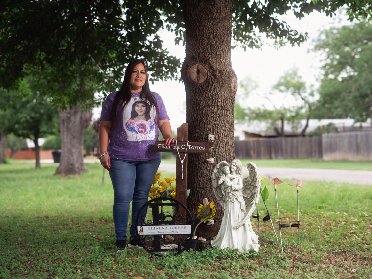 Sandra Torres, who’s daughter Eliahna Torres was killed in the Massacre at Robb Elementary School, poses for a portrait next a memorial for her daughter on April 26, 2023 in Uvalde, Texas.