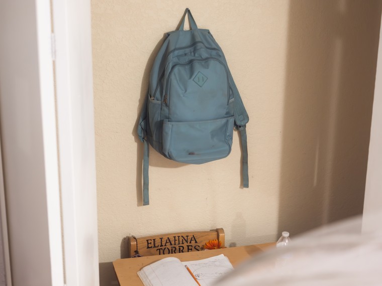 The small blue backpack Eliahna Torres wore the day she was killed, hanging in a closet in a room dedicated to her, on April 26, 2023 in Uvalde, Texas.