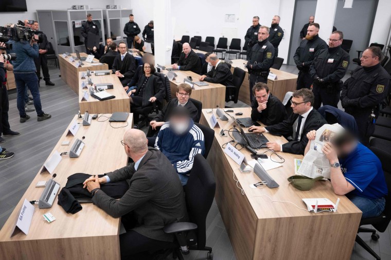 Defendants sit on May 16, 2023 at the Higher Regional Court in Dresden, eastern Germany, prior to a hearing in the trial over a jewellery heist on the Green Vault (Gruenes Gewoelbe) museum in Dresden's Royal Palace in November 2019. 