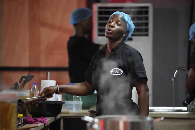 By Monday, Hilda Baci had cooked for more than 97 hours, becoming a national sensation and to the cheering of many in Nigeria's commercial hub of Lagos where her kitchen is set. 