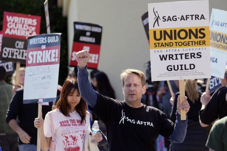 Actor and SAG-AFTRA member Jeffrey Reeves takes part in a Writers Guild of America rally outside Paramount Pictures studio, Monday, May 8, 2023, in Los Angeles.