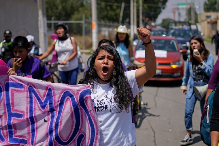 Roxana Ruiz during a march in Chimalhuacán, Mexico, in 2022 in memory of Diana Velázquez, who was making a call outside her home in 2017 when she disappeared and was raped and killed. 