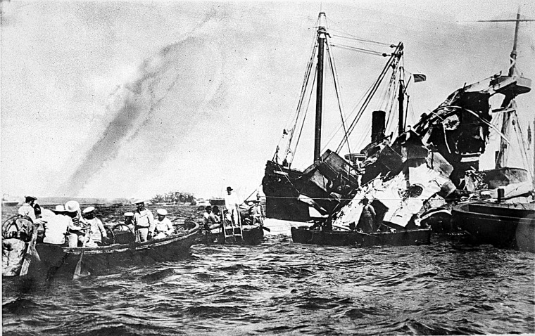 Lifeboats rescue surviving crewmen of the wrecked USS Maine after an underground explosion destroyed the battleship, killing about 260 U.S. Naval personnel, on the night of Feb. 15, 1898 as it was anchored in the Havana harbor, Cuba.