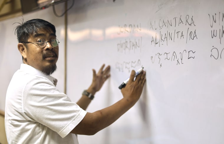 Baybayin instructor Jay Enage teaches a workshop at the National Science High School in Pasay, Manila.