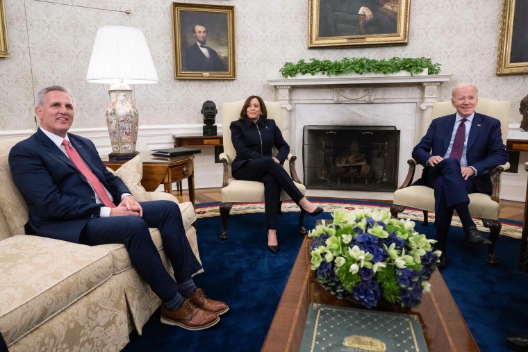 President Joe Biden is joined by Vice President Kamala Harris during a meeting with House Speaker Kevin McCarthy and other Congressional leaders in the Oval Office on May 16, 2023.