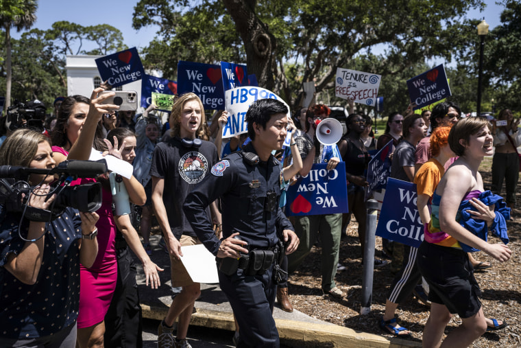 Protesters on the campus of New College of Florida protest rightwing activist Christopher Rufo after he attended a bill signing event with Florida Gov. Ron DeSantis in Sarasota on May 15, 2023.