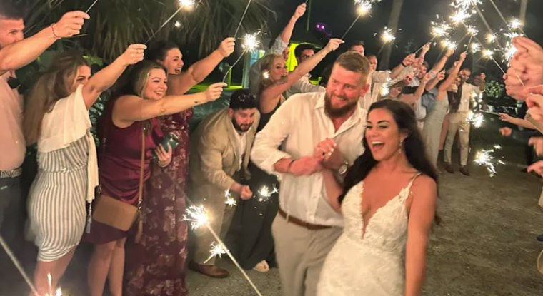 Samantha Miller and Aric Hutchinson at their wedding.