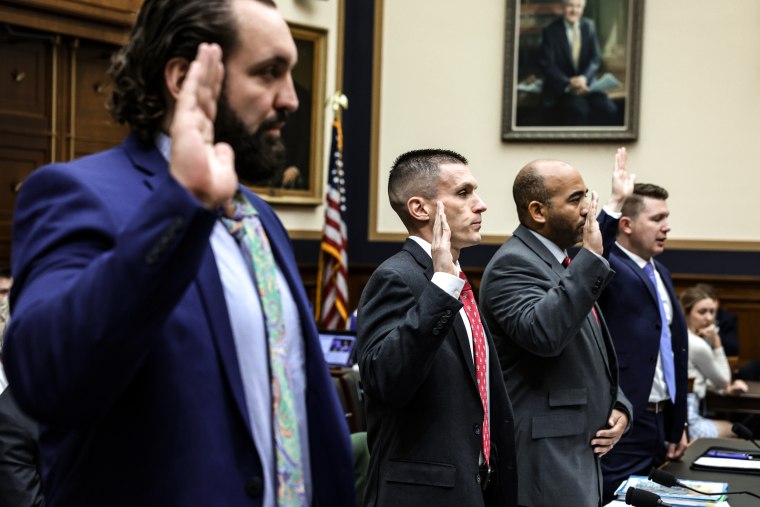 Suspended FBI special agent Garret O’Boyle, former FBI agent Steve Friend, suspended FBI agent Marcus Allen, and Empower Oversight President Tristan Leavitt are sworn in during a hearing before the Select Subcommittee on the Weaponization of the Federal Government of the House Judiciary Committee at Rayburn House Office Building on May 18, 2023 on Capitol Hill.